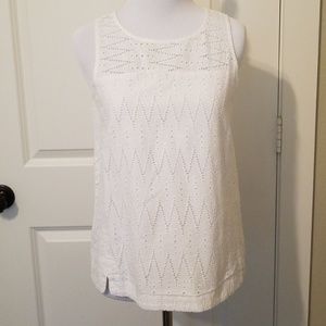 White sleeveless blouse